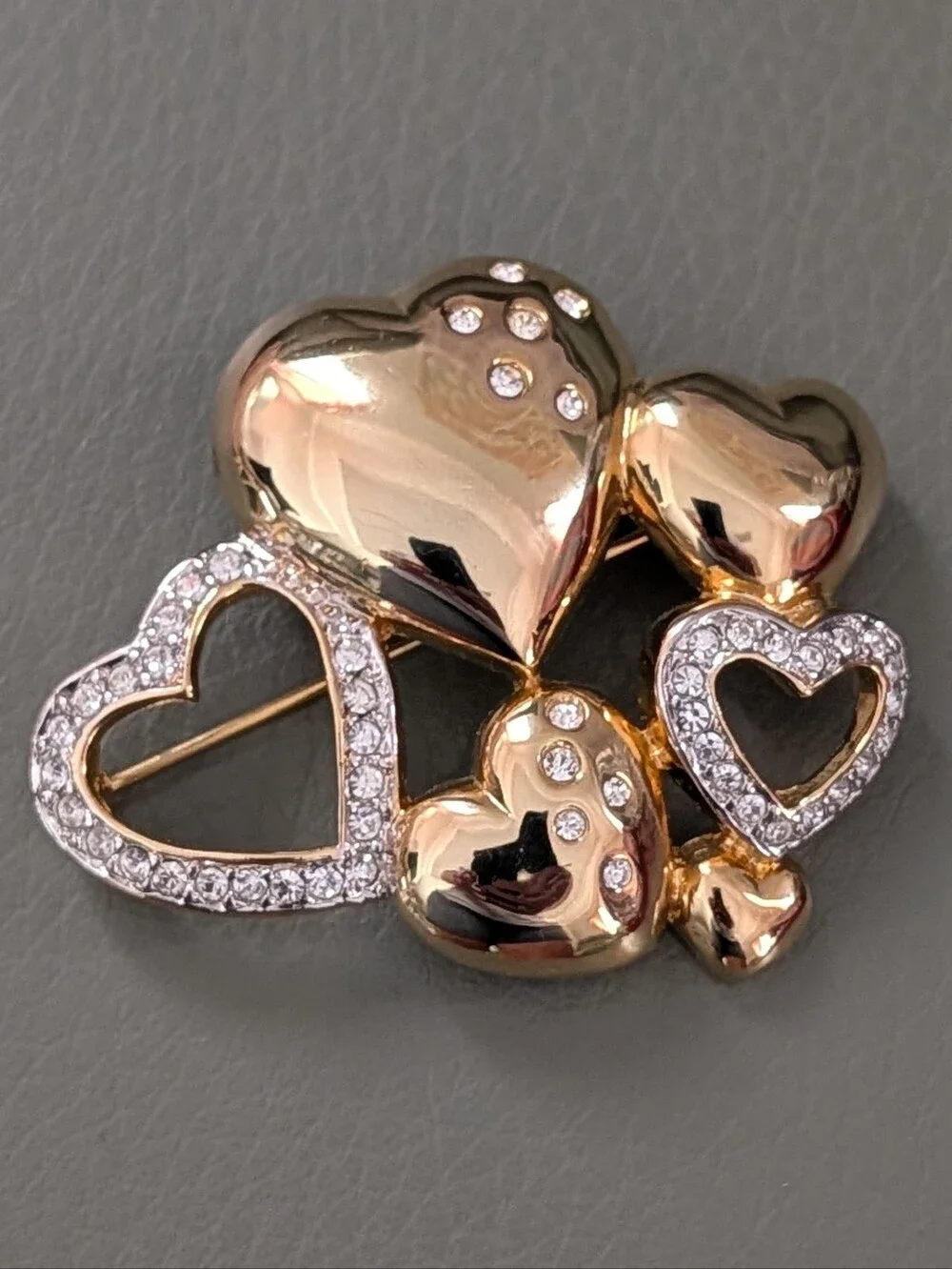 Vintage 3D Gold Tone Heart Cluster Brooch Adorned With Clear Rhinestones